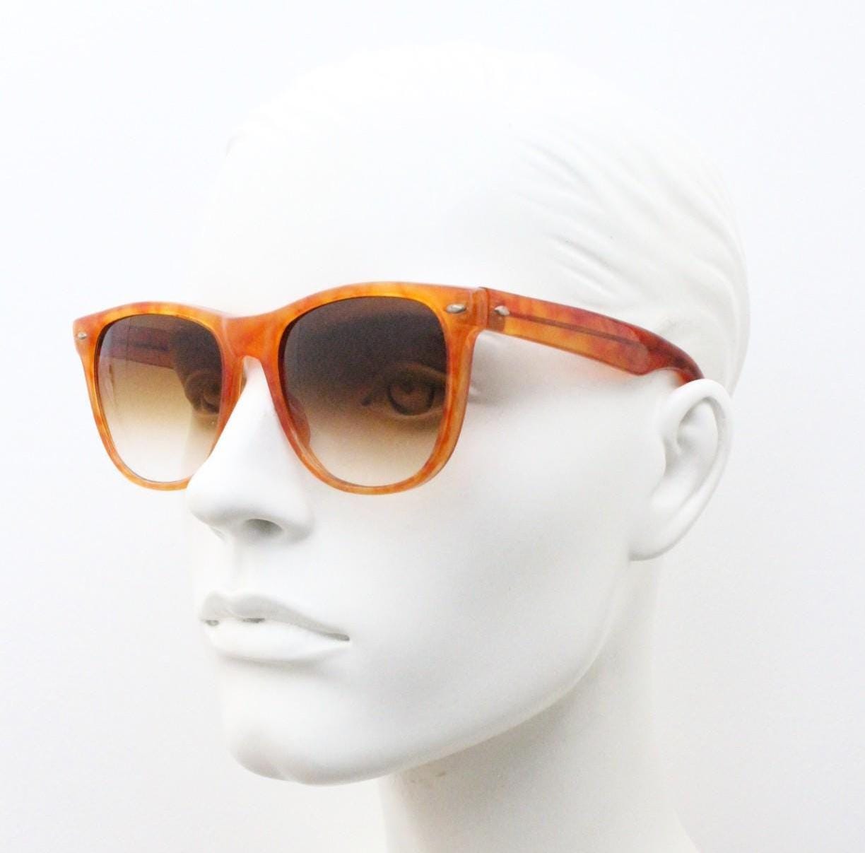 Vintage 80s square horn rim sunglasses. All time classic Wayfarer design in vibrant orange frame and superb graduating lenses