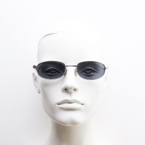 90s vintage small bug eye rectangular sunglasses. Satin finish silver frame with black gloss arms. Unused. 2000s. NOS