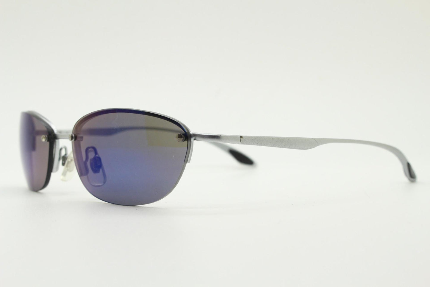 90s vintage small bug eye oval sunglasses. Minimal silver satin finish solid metal half frame with blue mirror lenses. Y2K.  NOS sample