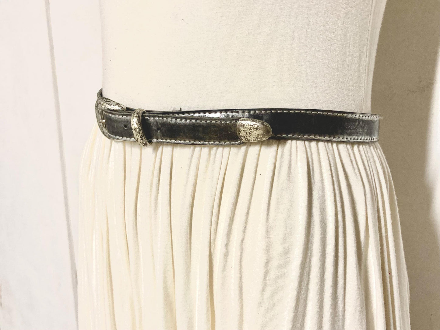 90s vintage womens dress or jeans / trousers belt in distressed worn metal looking finish. Vinyl on leather construction. Made in France