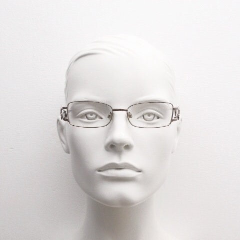 Missoni rectangular low profile eye glasses. Brown chrome optical frames with flower detail. Prescription eyeglasses. RX spectacles