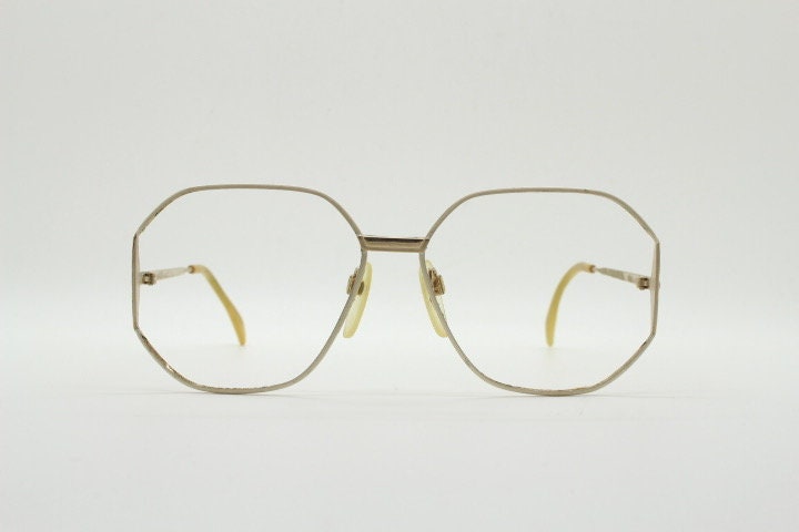 Silhouette 70s vintage octagon eye glasses. Womens sophisticated angular golden optical frame with white detail. Prescription eyeglasses. Rx