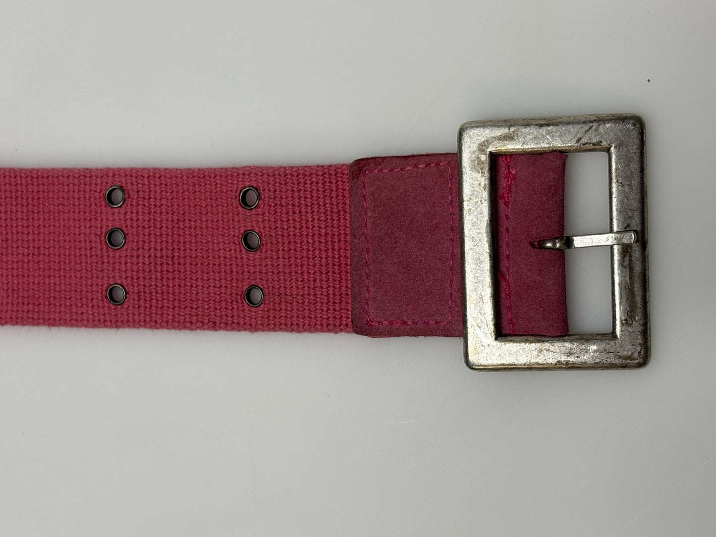 Y2k vintage thick candy pink army style belt with distressed metal buckle and 3 rows of lace holes. Statement feature / to cinch a dress