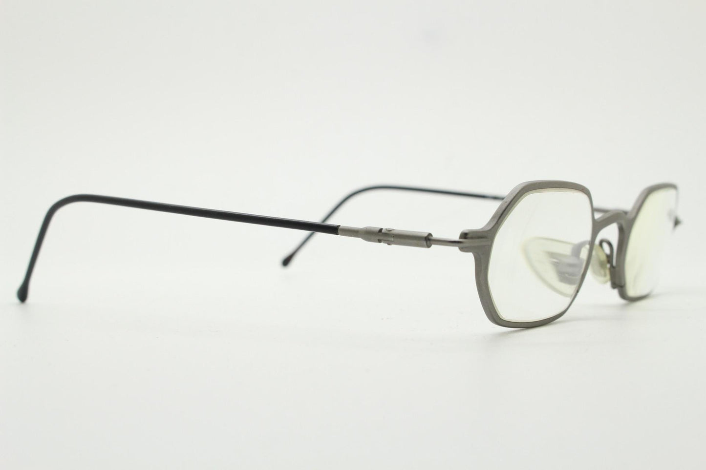 DKNY 90s vintage hexagon eye glasses made in Italy. Small matt grey optical frames. Prescription RX. Donna Karan. Victorian style steampunk