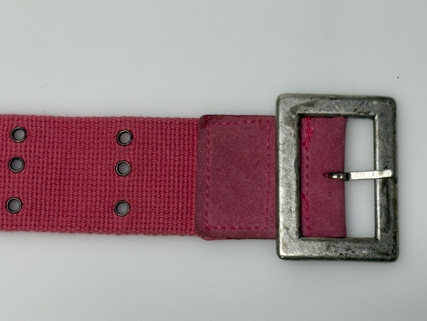 Y2k vintage thick candy pink army style belt with distressed metal buckle and 3 rows of lace holes. Statement feature / to cinch a dress