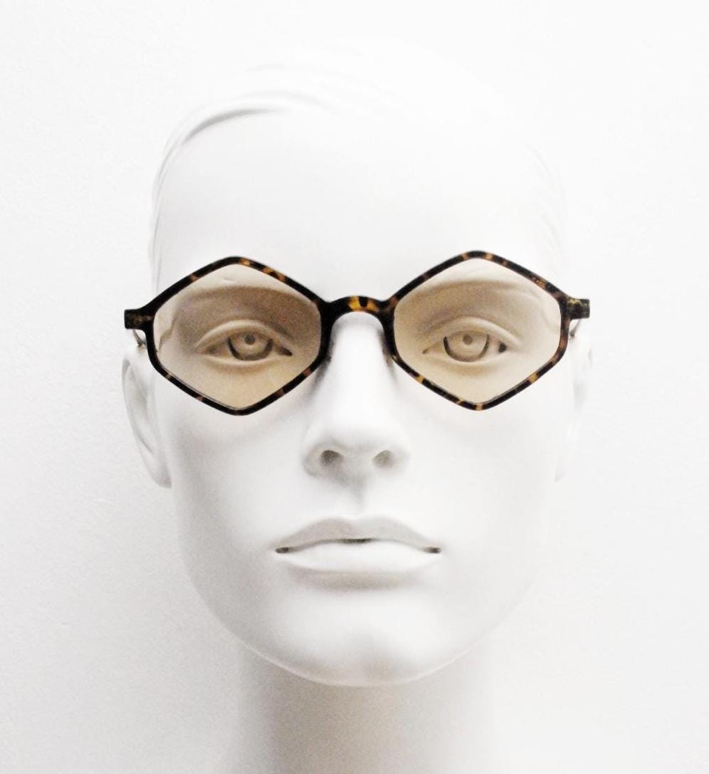 90s vintage diamond hexagon sunglasses. Atmospheric 6 sided tortoise gloss frame with very light tone brown lenses. Unused NOS