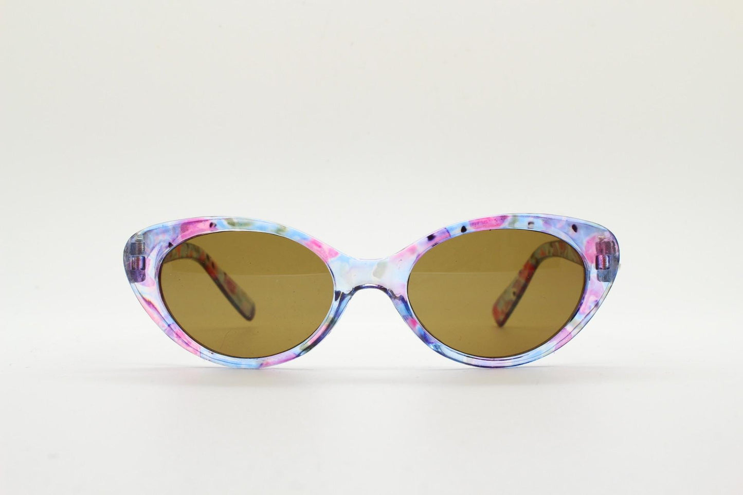 90s vintage oval cat eye sunglasses. Vibrant transparent multi coloured frame with mid tone brown lenses. 80s. NOS. BNWT
