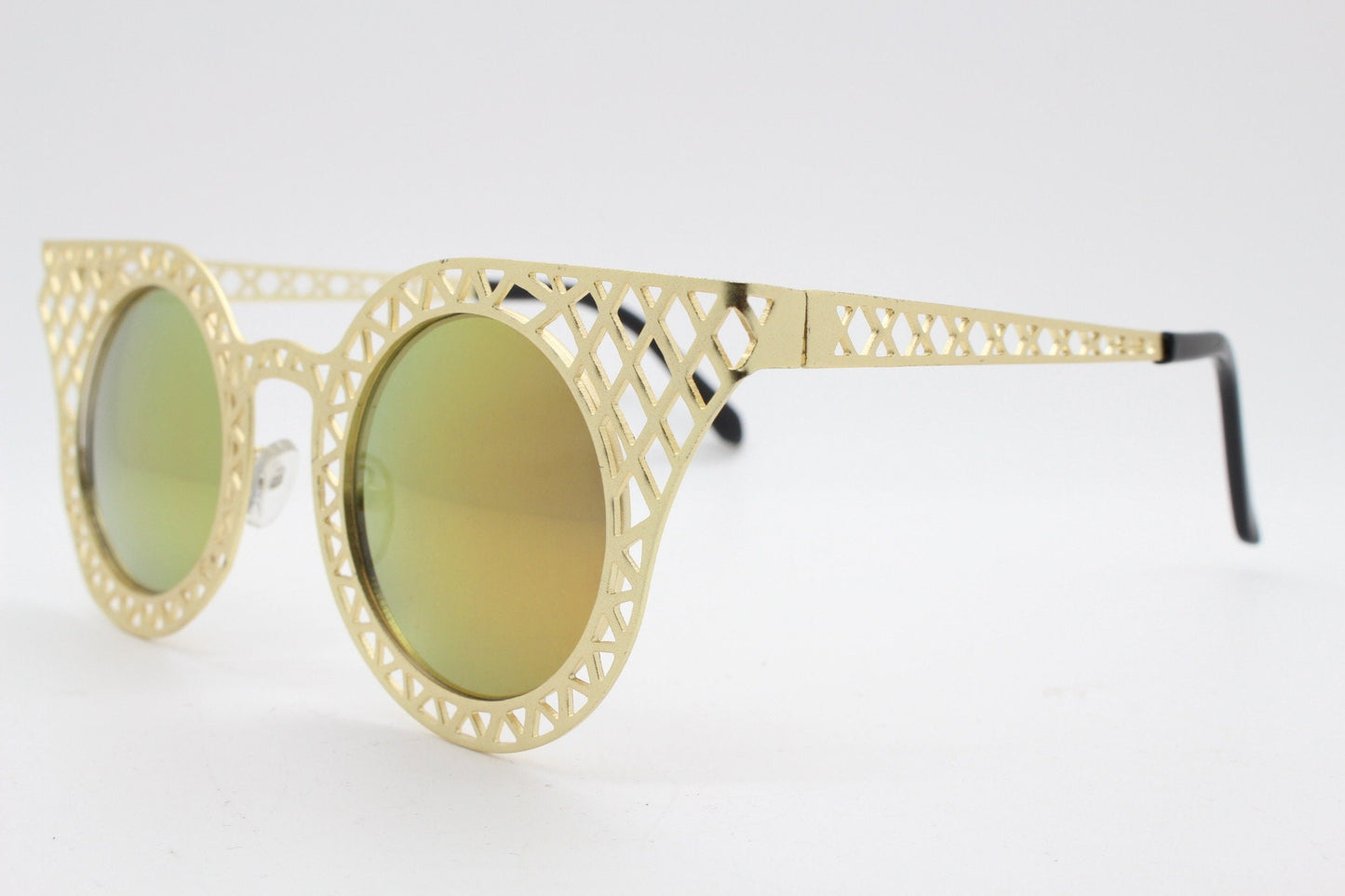 Y2K vintage metal cat eye sunglasses. Women's gold cut out lattice scaffold cateye frame with goldburst mirror lenses. 2000s. BNWT