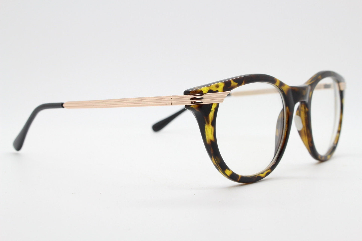 90s vintage cat eye glasses in tortoise with gold metal arms. 50s, 60s style cateye prescription optical frames. Clear lens eyeglasses. RX