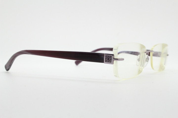 Givenchy rectangular frameless eye glasses made in Italy. Minimal optical frame with marbled brown arms. Prescription RX spectacles. Vintage