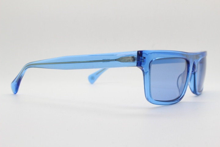Kaleos rectangular flat top sunglasses. Bright sky blue acetate chunky frame with same colour lenses. BNWOT