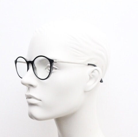 Vogue womens oval eye glasses model 5223. Black acetate optical frames with metal arms. Prescription eyeglasses. RX spectacles