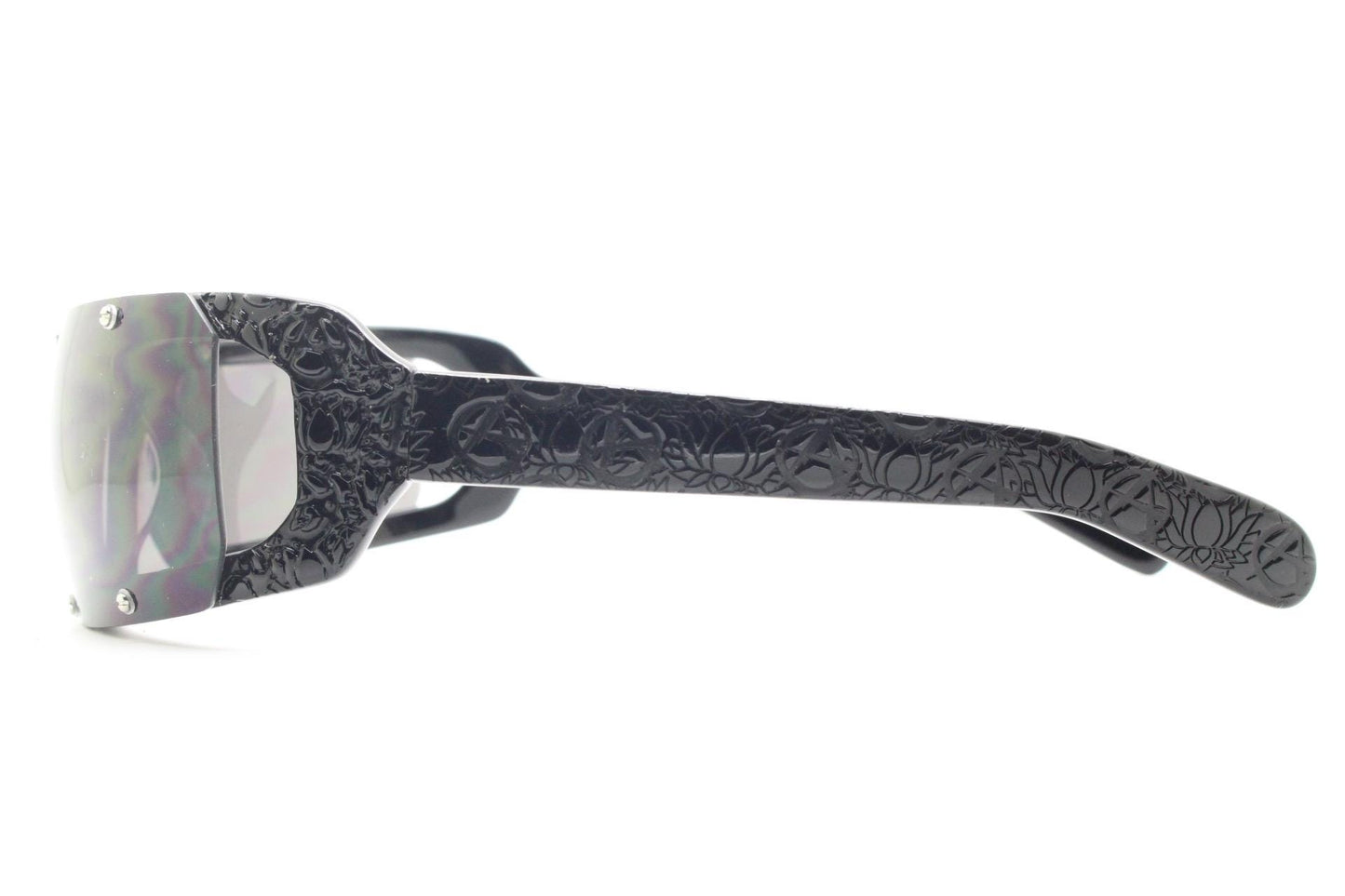 Buddhist Punk wrap around sunglasses hand made by Linda Farrow. Black acetate frame with abstract cut out patterns. Projects. Vintage. NOS