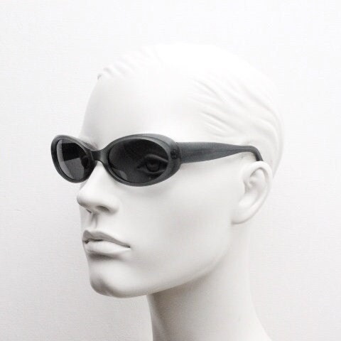 Giorgio Armani 90s vintage oval sunglasses made in Italy. Transparent grey\blue acetate frame with matching lenses. Small bug eye. Y2K