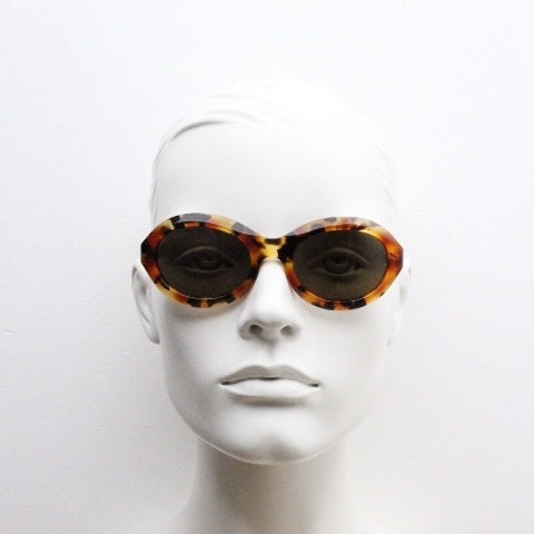 Francois Pinton Paris 90s vintage oval sunglasses made in France. Womens thick acetate frame in brown and amber tones. NOS