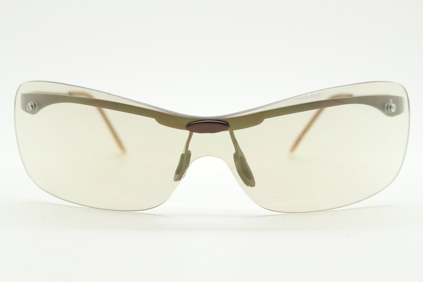 Y2K vintage visor sunglasses. 2000's wrap around sport shield design. Brown chrome brow with light tone lens. NOS 00's. 90S