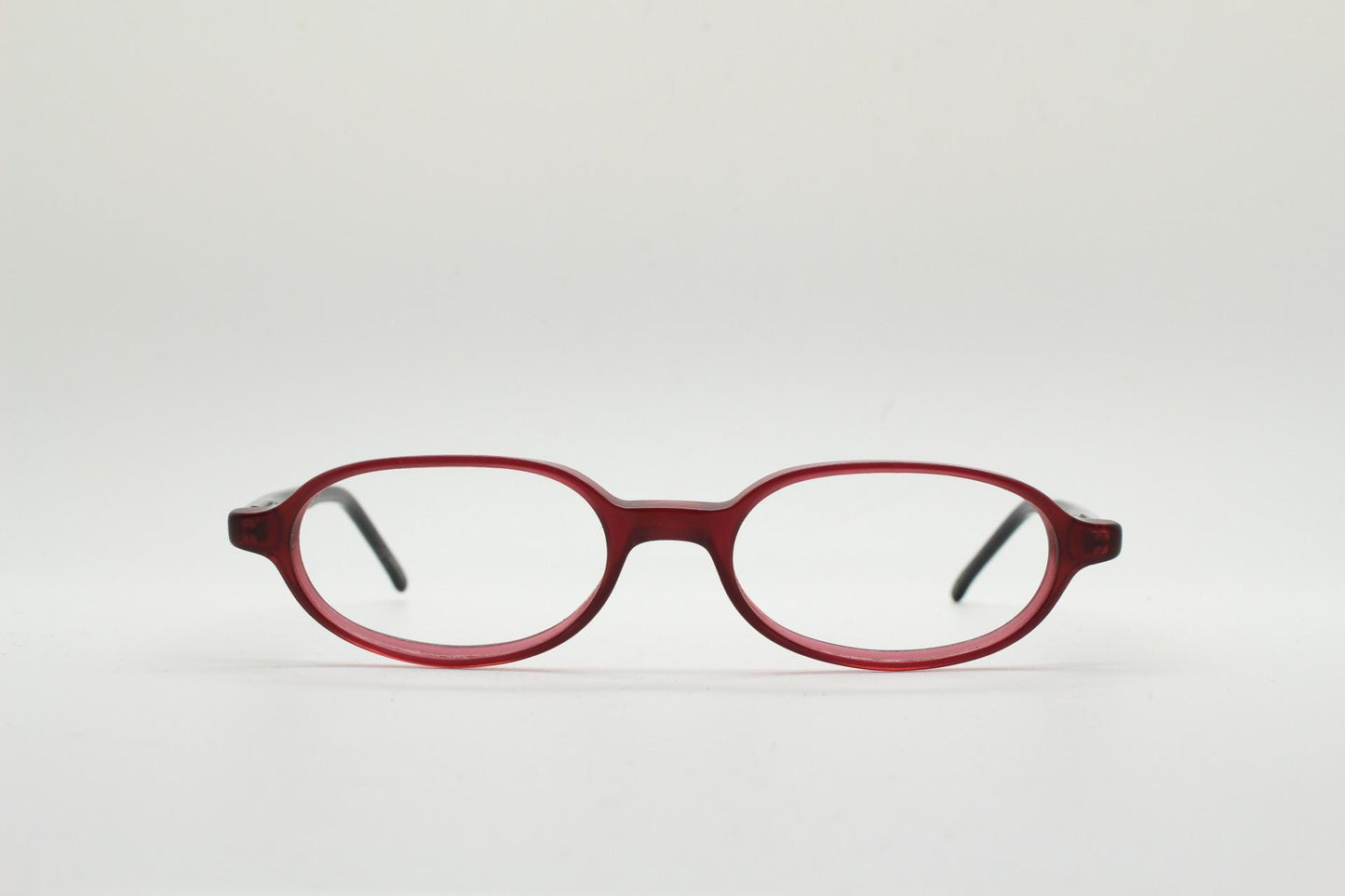 Diesel small oval eye glasses. Transparent brown front with black gloss arms. Acetate optical frames. Prescription 90s Vintage RX Spectacles