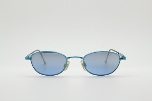 90s vintage small oval sunglasses by X-line. Unusual blue chrome metal frame with well matched mirror lenses. Quality NOS