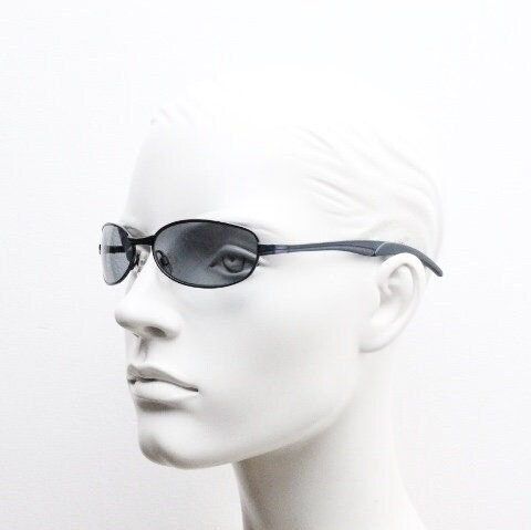 90s vintage oval small bug eye sunglasses. Curved grey satin finish solid metal frame. Rave. Steampunk. Unused NOS