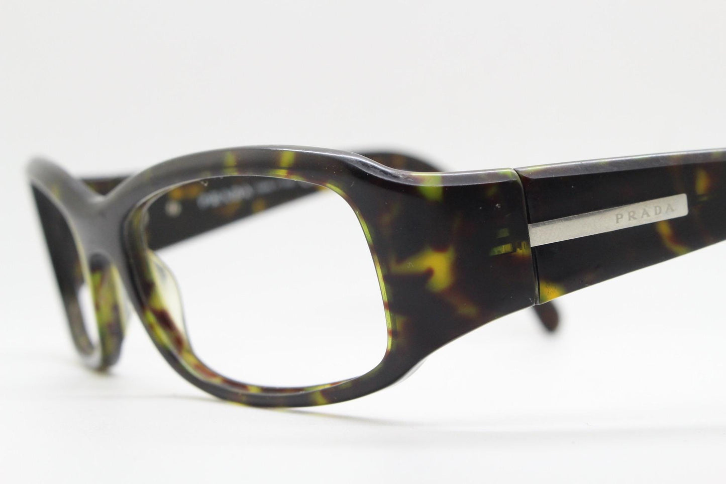 Prada rectangular wrap around eyeglasses made in Italy. Tortoise curving acetate optical frame with tall arms. Vintage prescription glasses