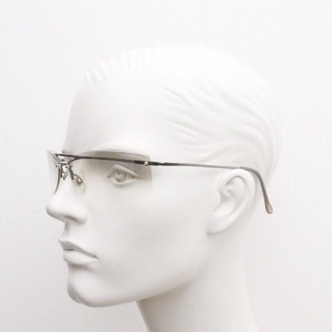 Y2K vintage wraparound sunglasses. Sick fashion grail half frame in grey chrome with extra light tone curving mirrored lenses. 2000's NOS
