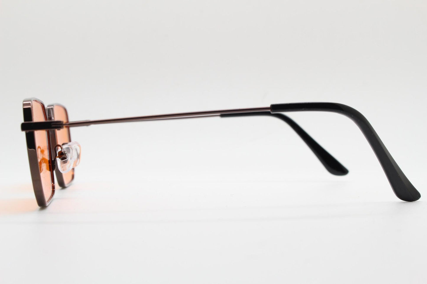 90s vintage angular 6 sided sunglasses. Brown chrome metal frame with blazing flat orange lenses. Rectangular psychedelic sunnies. BNWT