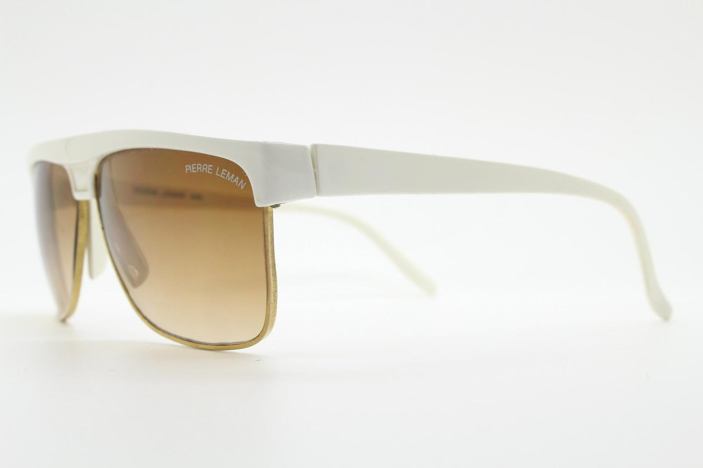 Pierre Leman Paris 80s vintage rectangular sunglasses made in France. Ice white flat top half frame with brown graduating lenses