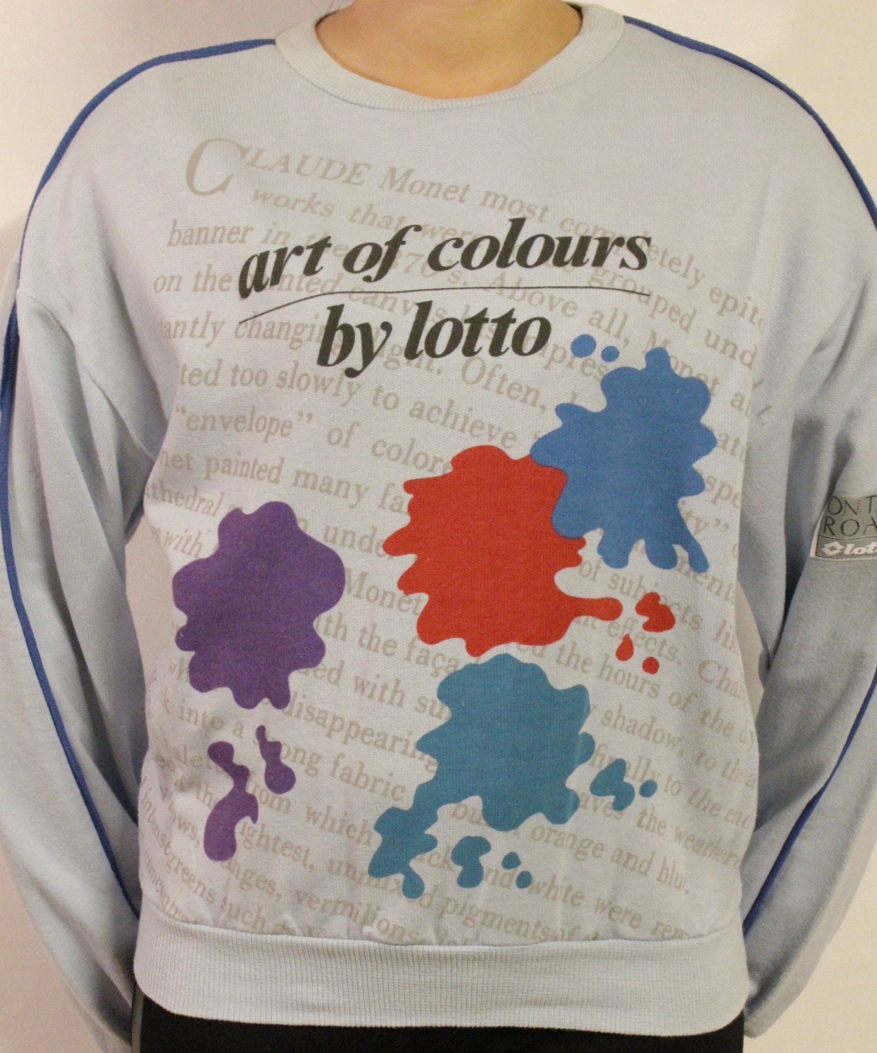 Vintage 80s blue sweatshirt by Lotto with 'art of colours' paint splash graphic. Made in Italy.