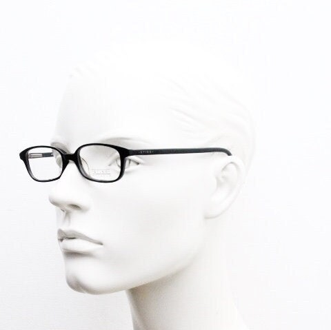 Sting 90s vintage rectangular eye glasses made in Italy. Plain black gloss low profile acetate optical frames. Prescription RX. NOS