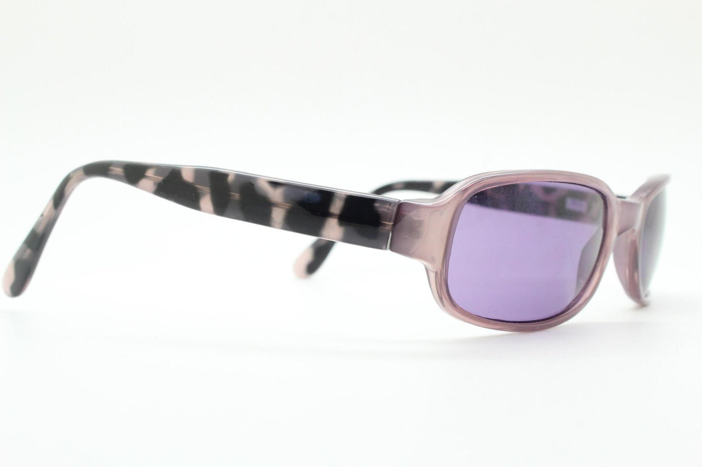 Y2k vintage wrap around sunglasses. Curved low profile frame with extraordinary purple turtle arms and well matched lenses. 2000's NOS