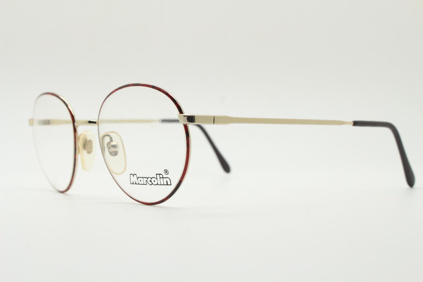 Marcolin 90s vintage round metal eye glasses made in Italy. Panto shape optical frames with attractive red and black front. Prescription RX