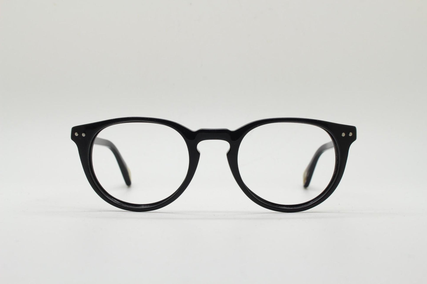 90s vintage oval eye glasses by Alles Brille of Germany. Classical black gloss acetate optical frames with keyhole bridge. RX Spectacles