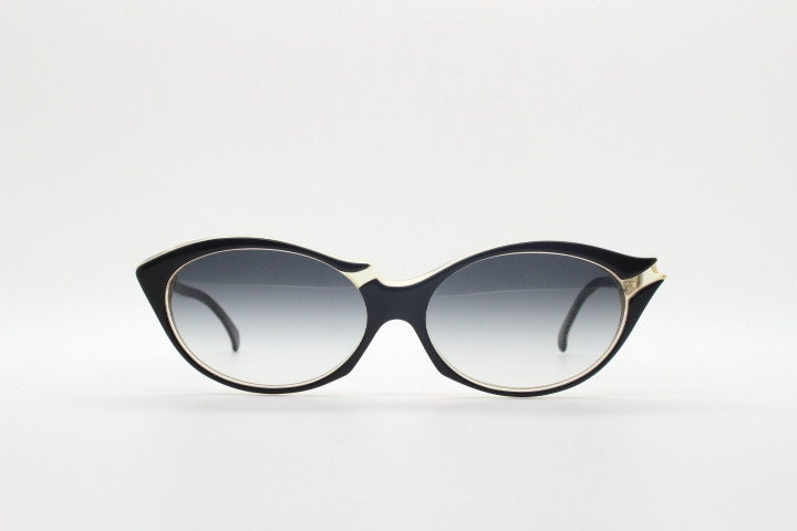 Alain Mikli Paris cat eye glasses made in France. Radical redefinition of the cateye optical frame. Womens prescription eyeglasses. RX