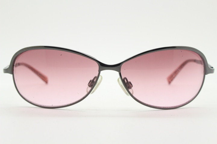 2000s vintage purple mini bug eye aviator sunglasses. Grey chrome frame with sensational graduating mulberry lenses. Y2K. 90s. Unused NOS
