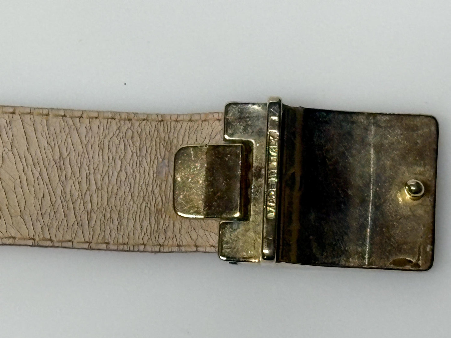 Pierre Cardin 80s vintage belt in genuine snakeskin with neat sized rectangular enamelled black and brown striped buckle. Made in Italy