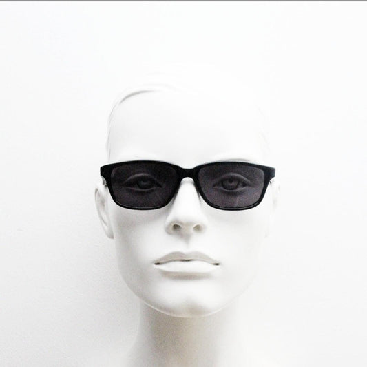 Vintage 90s slim rectangular modified wayfarer design sunglasses made in Italy. All black gloss low profile acetate frame. Unused NOS