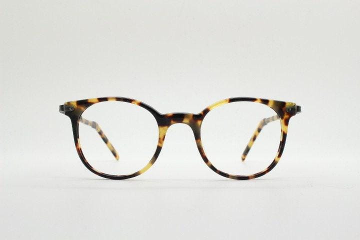Sting 90s vintage round eye glasses made in Italy. Honey tortoise acetate optical frames. 40s retro design. Prescription eyeglasses. RX