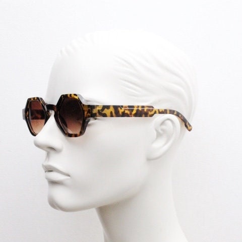 90s vintage hexagon sunglasses. 6 sided honey tortoise gloss chunky frame with graduating Havana brown lens tone. NOS