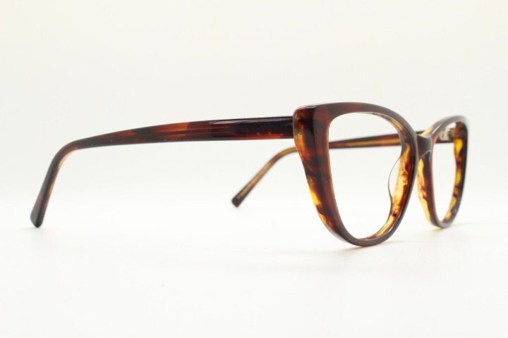 Tom Woolf vintage pointed cat eye glasses. Transparent mottled brown cateye optical frame. Womens prescription eyeglasses. RX spectacles
