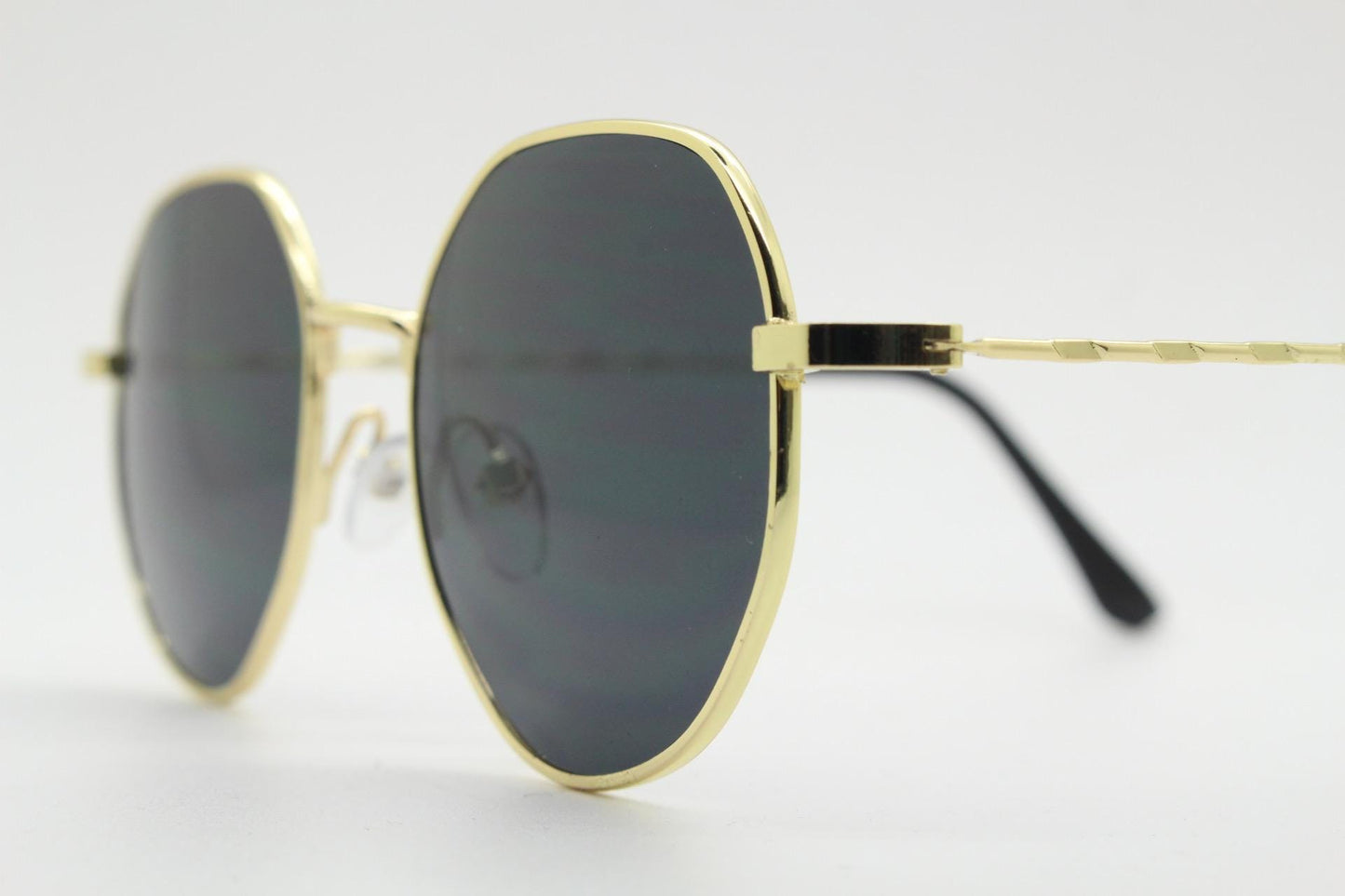 90s vintage modified aviator sunglasses, 6 sided soft angled metal frame in gold chrome with indented patterned arms. Unused NOS