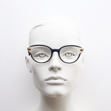 Nina Ricci vintage cat eye glasses. Yellow crystal and black acetate cateye optical frames gold metal arms. Womens prescription spectacles
