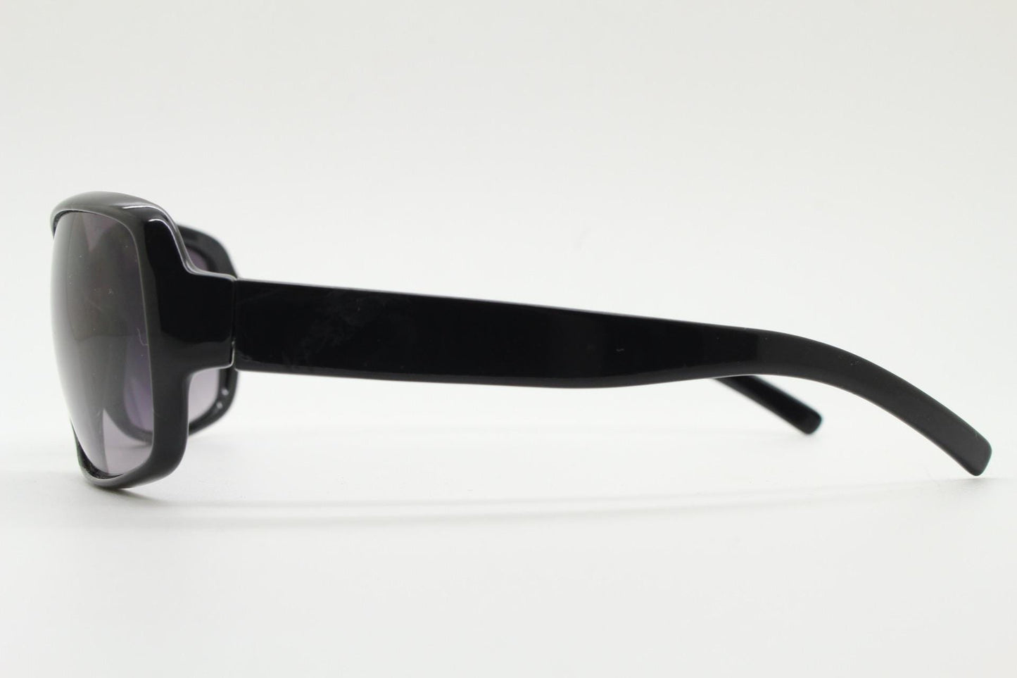 Y2k vintage wrap around rectangular sunglasses. Curved black gloss frame with graduating grey lenses. 2000's bug eye. NOS