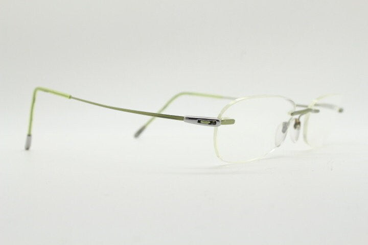 Silhouette rectangular frameless eye glasses made in Austria. Minimal lightweight optical frame with silver trim. Prescription RX