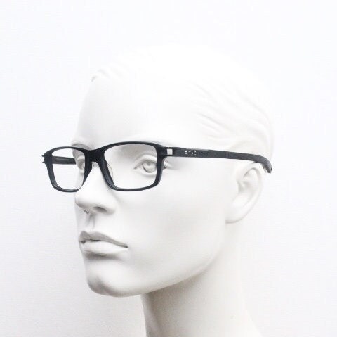 Tag Heuer rectangular eye glasses. Patented design made in France. Solid acetate optical frame with flexible rubber arms. Prescription RX