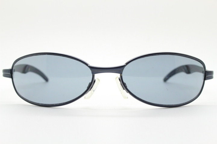 90s vintage oval small bug eye sunglasses. Curved grey satin finish solid metal frame. Rave. Steampunk. Unused NOS