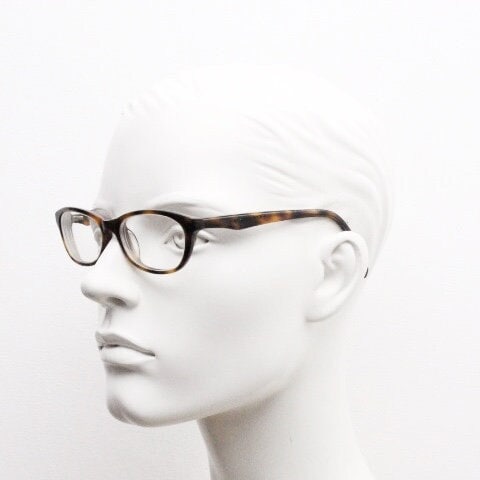 Calvin Klein Jeans modified cat eye glasses model CKJ918. Tortoise gloss low profile acetate optical frames. Prescription eyeglasses. RX