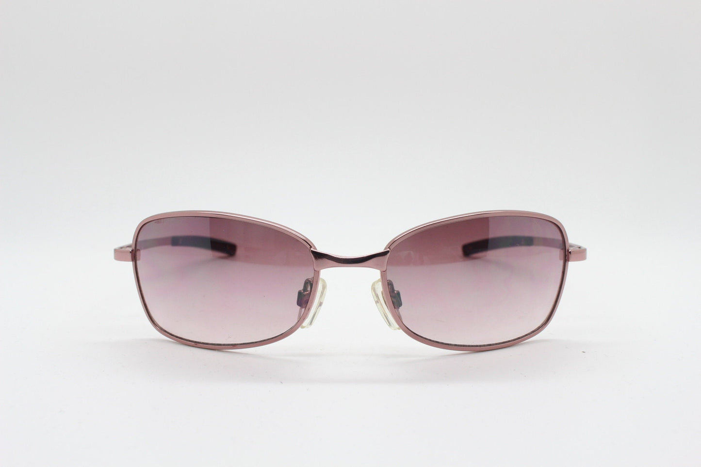 Y2K vintage curved sunglasses. Unusual Pink chrome metal frame with matching flared rectangular lenses. Unused 2000s NOS