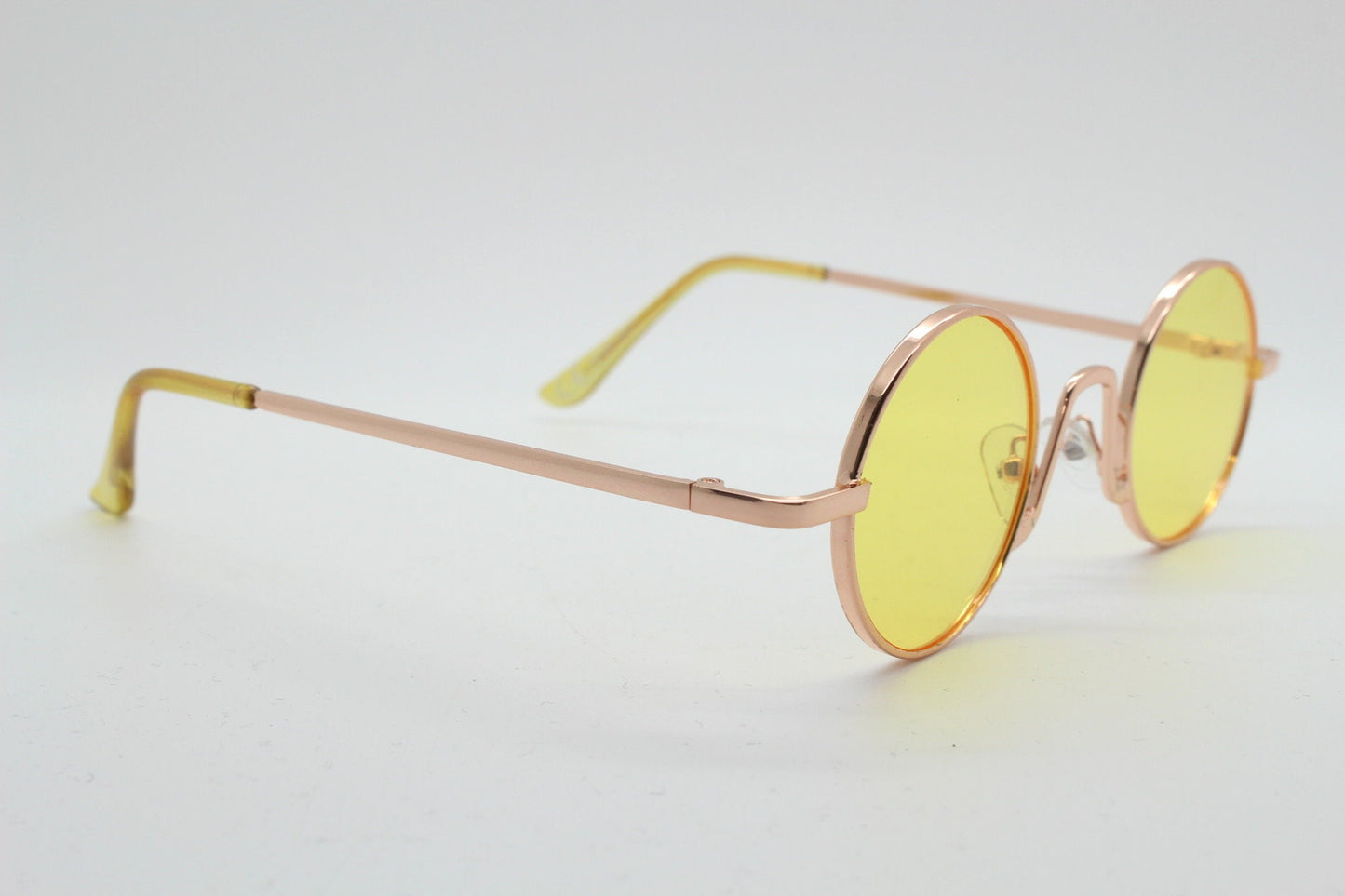 90s vintage small oval sunglasses. Imposing minimal gold victorian style frame with blazing canary yellow lenses. Steampunk. Unused BNWT