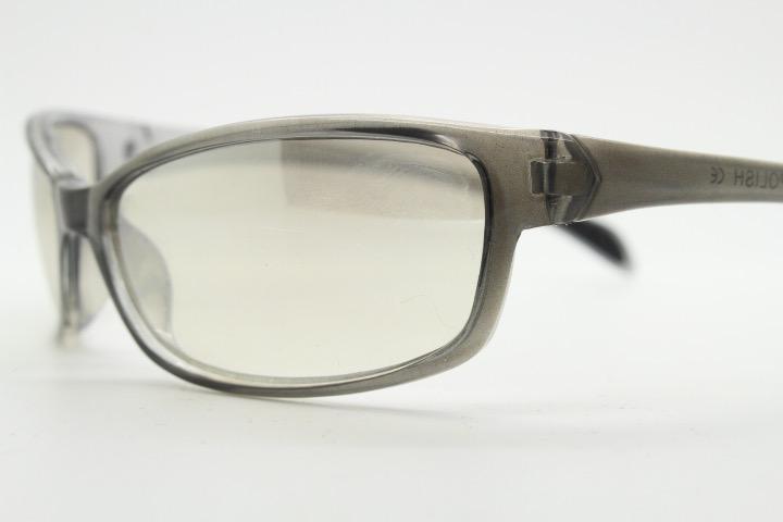 Y2K vintage futuristic sunglasses. Gloss white and grey wrap around shield style frame with light tone lenses. Cosplay visor. 2000s NOS