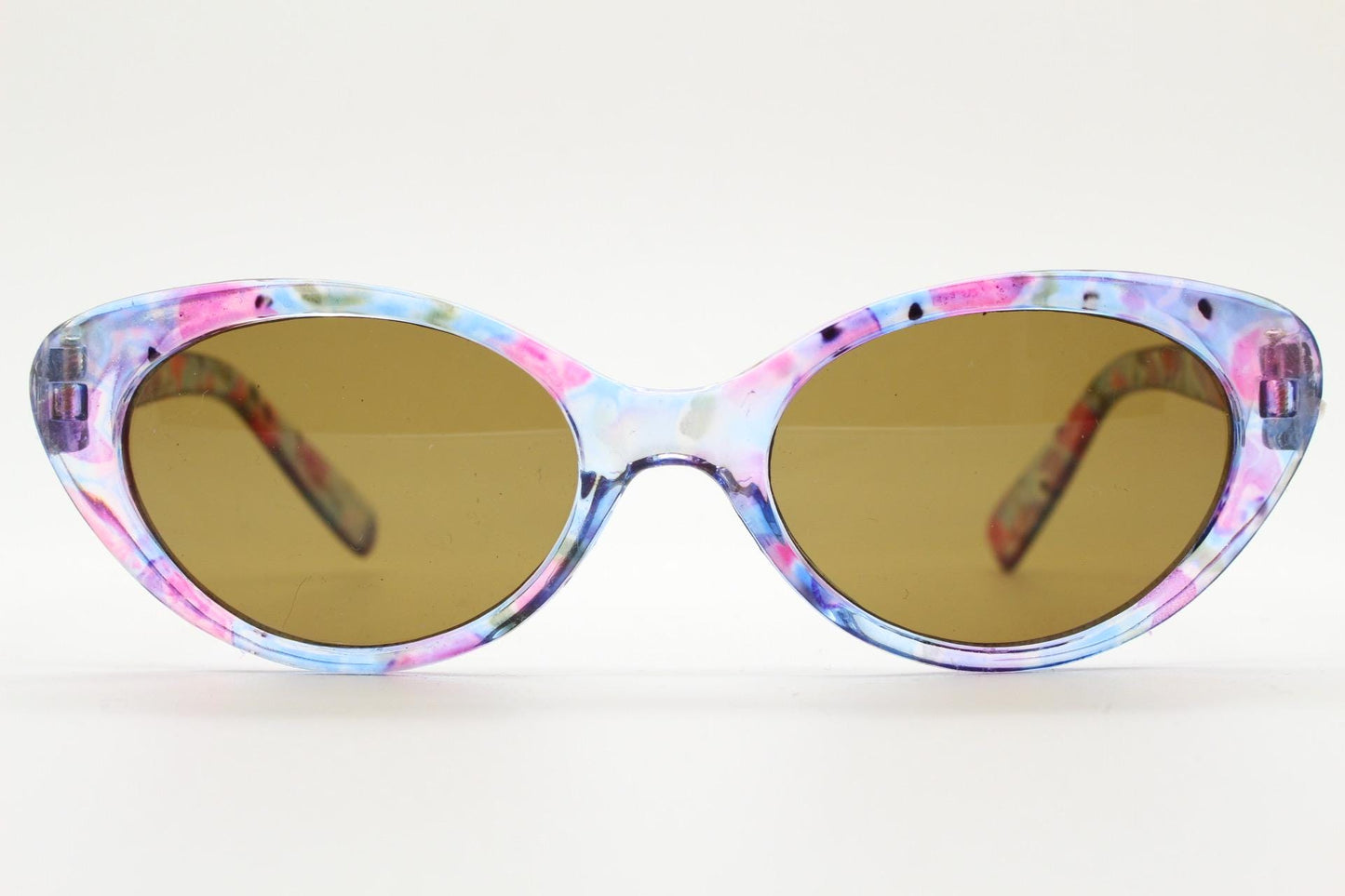 90s vintage oval cat eye sunglasses. Vibrant transparent multi coloured frame with mid tone brown lenses. 80s. NOS. BNWT